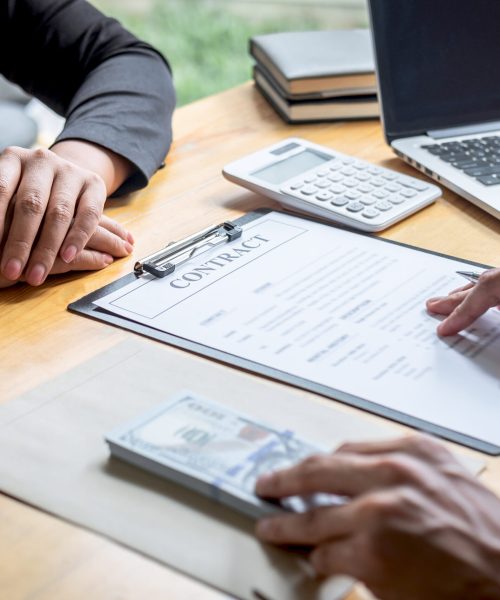Dishonest cheating in business illegal money, Businessman giving bribe money in business people to give success the deal contract of investment, Bribery and corruption concept.