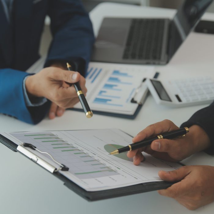 Team of business people are meeting to analyze data for marketing plan,Market research reports and income statistics, Financial and Accounting concept.